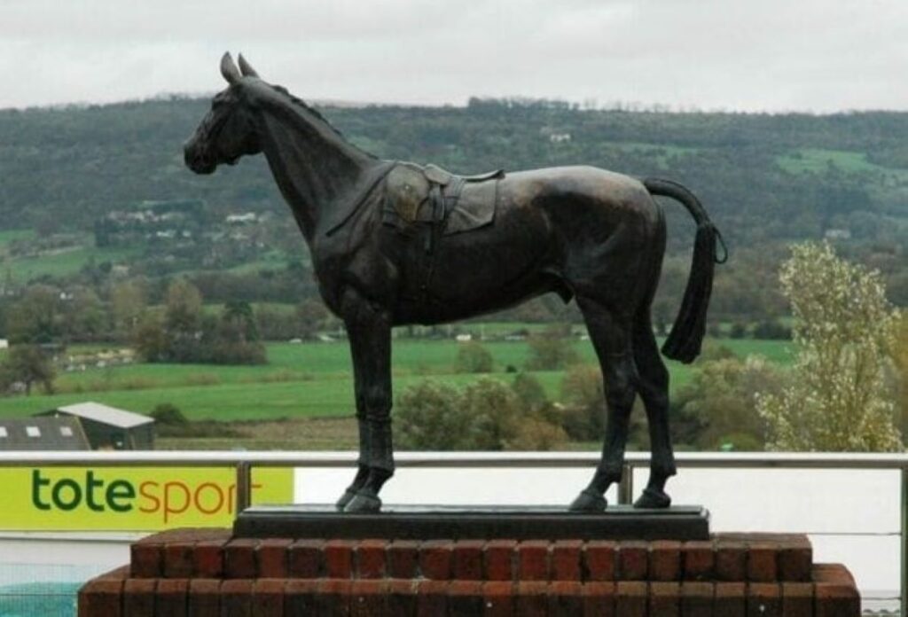A Bronze statue in tribute to Golden Miller at Cheltenham Racecourse