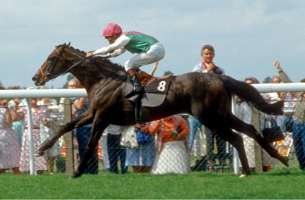 Dancing Brave galloping to victory